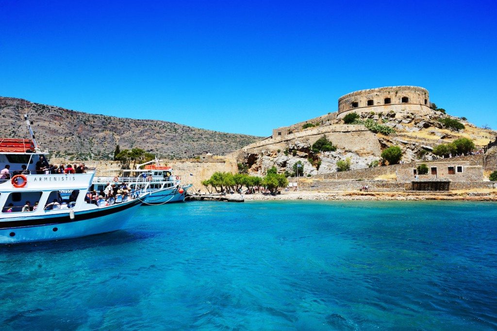 Day trips to Spinalonga begin with a gentle boat ride to the island